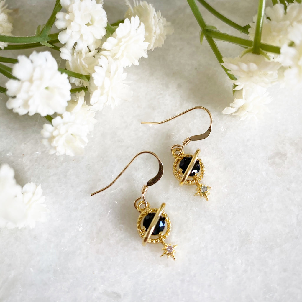 Orion Black Planet and Star Earrings Wisteria London
