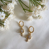 Wisteria London Orion Clear Planet And Star Huggie Hoops
